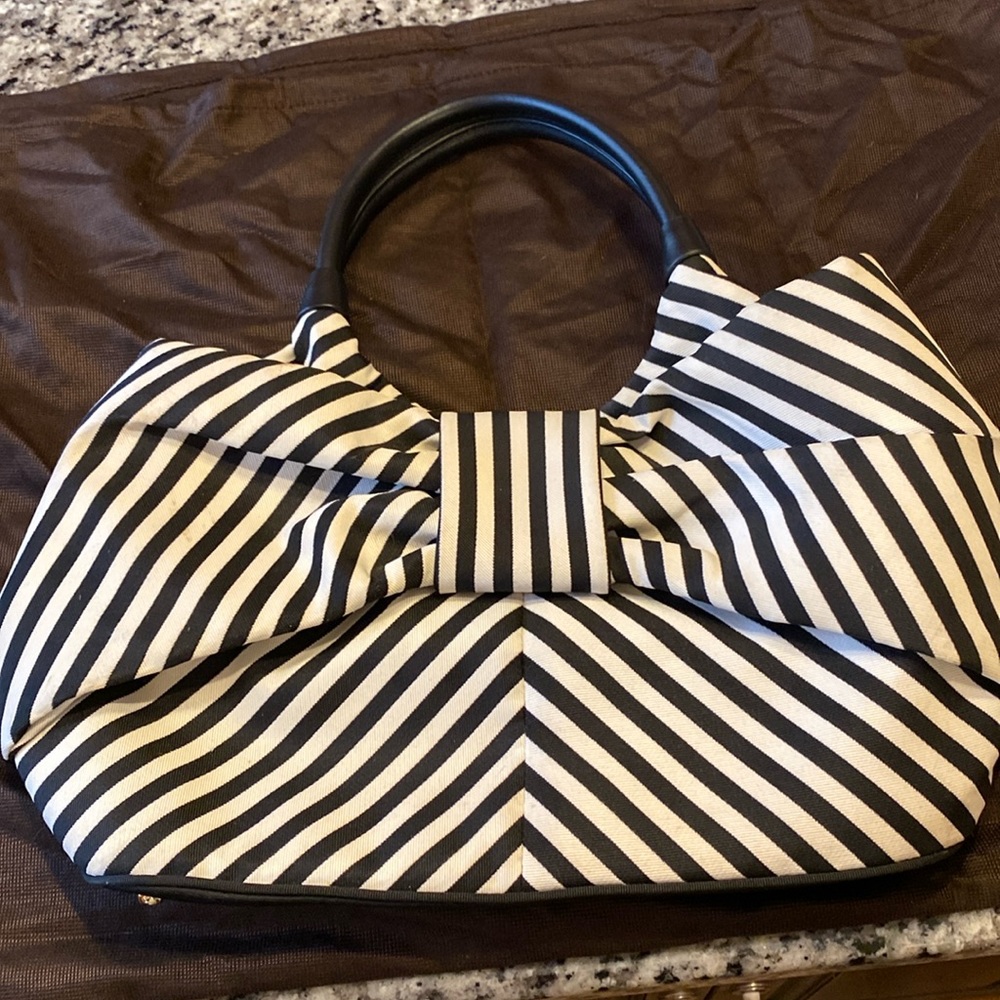 15” w x 8” tall x 6” deep.  Canvas Kate spade bag.